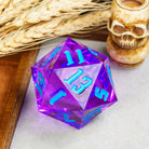 Giant 55mm D20 - Purple With Blue Numbers - Giant 55mm purple 20-sided acrylic die with translucent finish and raised blue numbers.