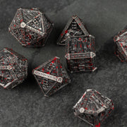 Bloody Necromancer Metal Dice Set - Metal necromancer-themed dice set with intricate designs and red accents on black finish.