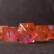 Heart Fire - Opalescent Sharp Edge Dice Set - Translucent fiery orange 20-sided sharp edge dice with black numbers and iridescent opalescent highlights.