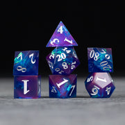 Midnight Blue Dice Set - Set of seven sharp-edged dice in midnight blue and purple tones with white numbering.