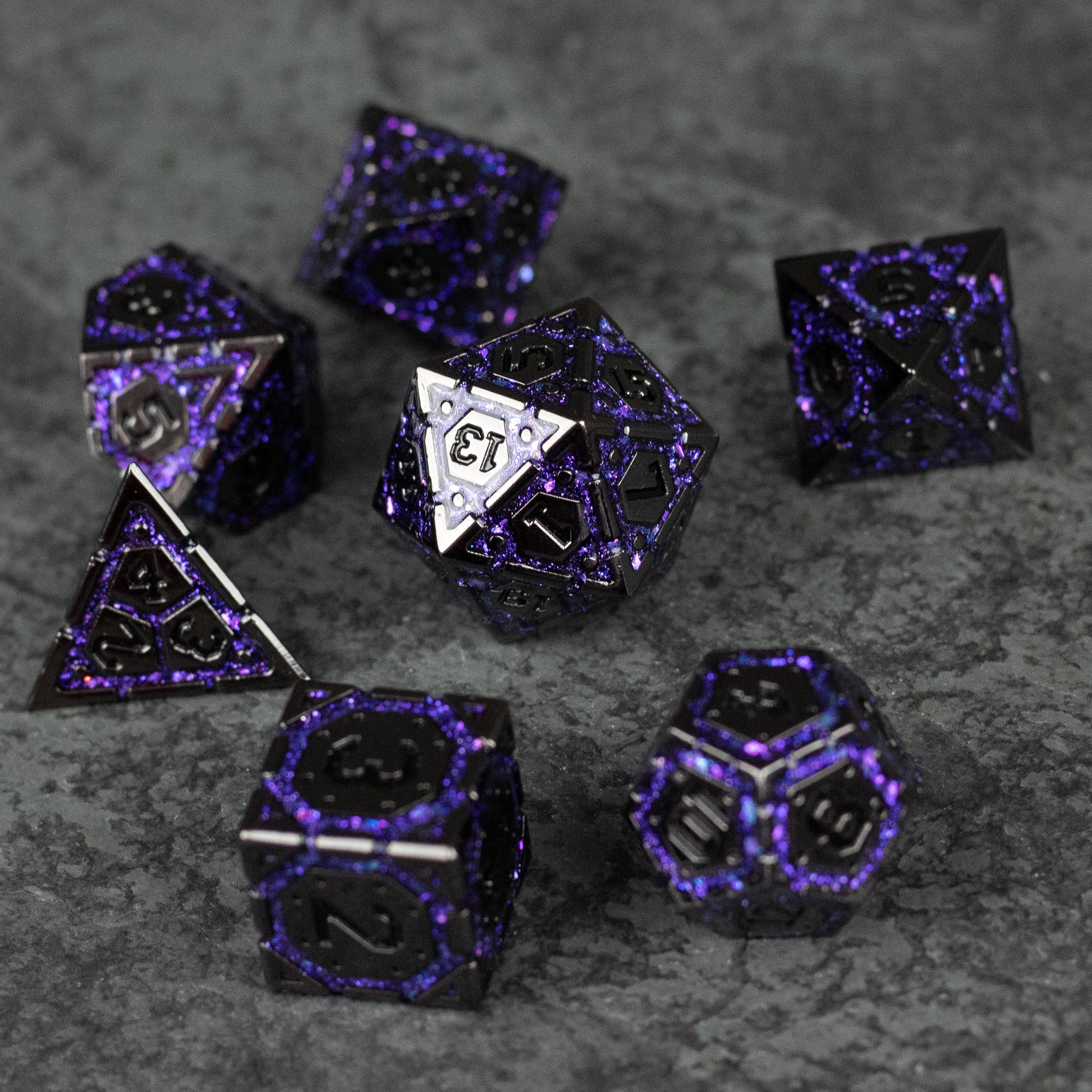 Purple Arcane Ward Dice Set - Black metal polyhedral dice set with purple arcane symbols and intricate glowing patterns.