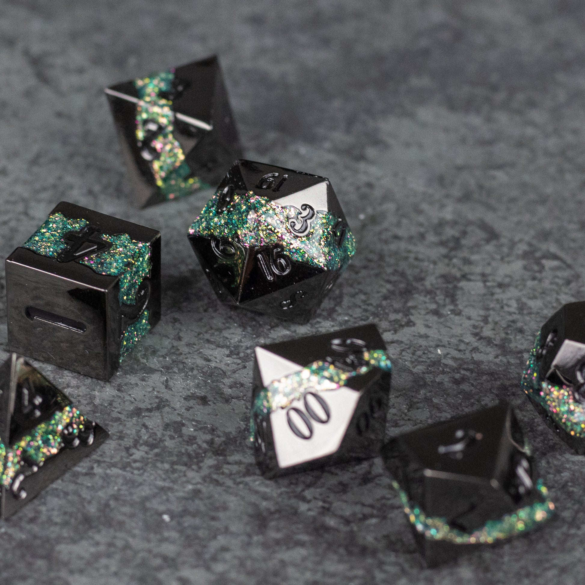 Light Green Rift Dice Set - Black metal dice with light green sparkling rift design and silver numbering, assorted polyhedral shapes.