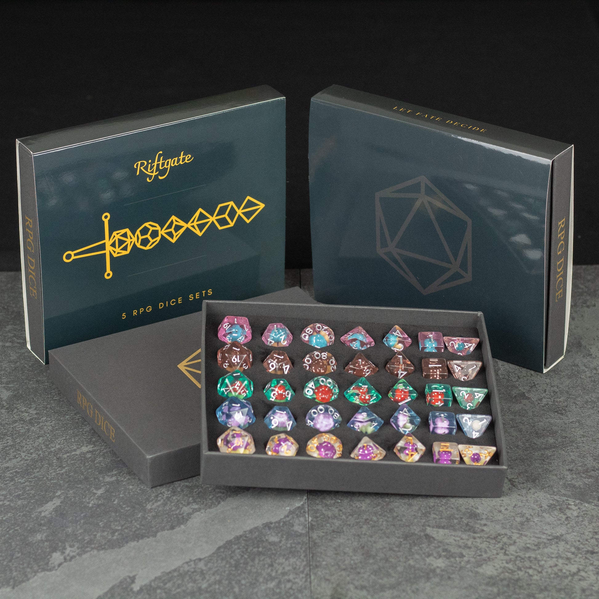Mushroom Dice Set Gift Box - Mushroom-themed polyhedral dice set with colorful caps in black gift box with gold lettering and geometric design.