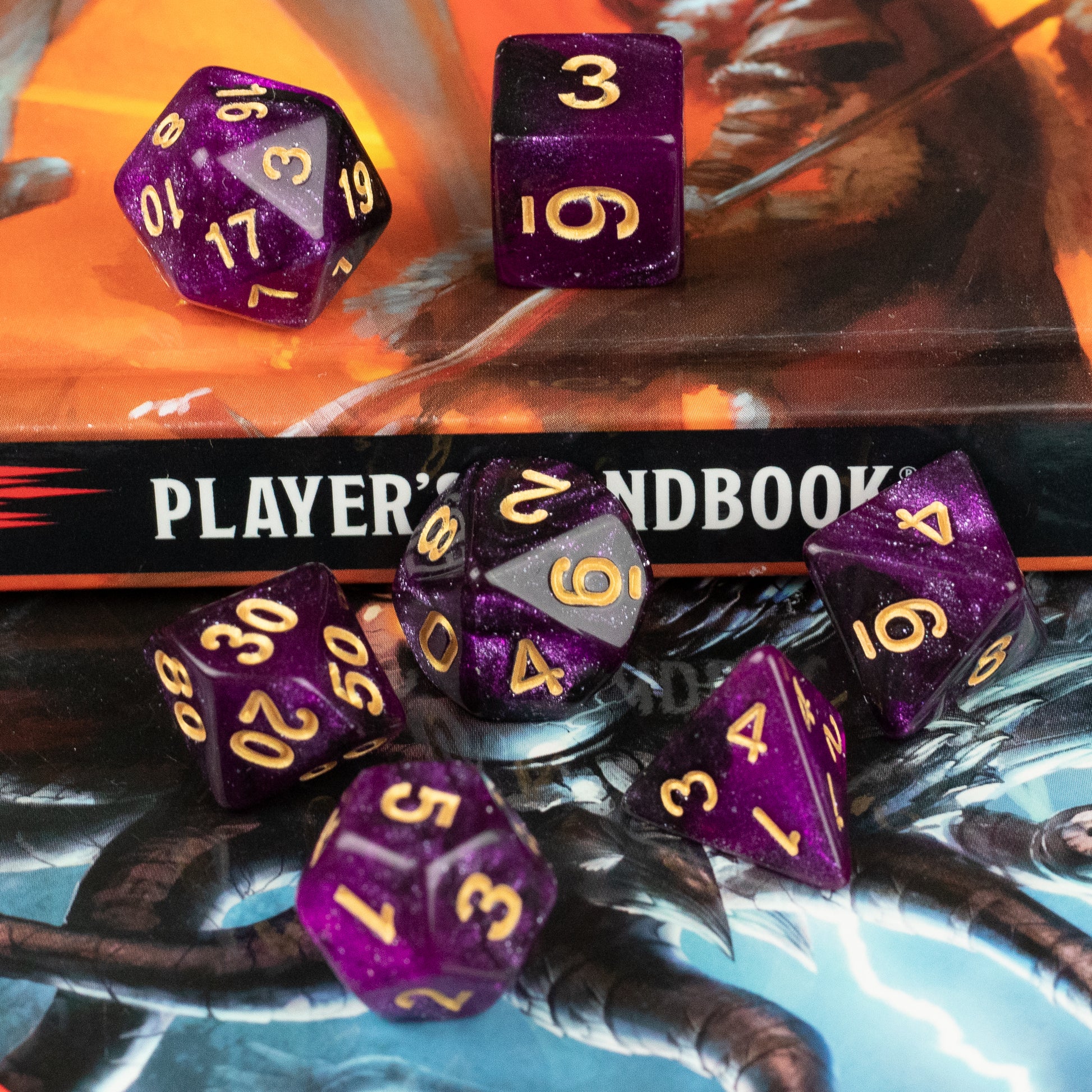 Purple and Black Glitter Dice Set - Purple and black glitter seven-piece dice set with gold numbers on tabletop background.