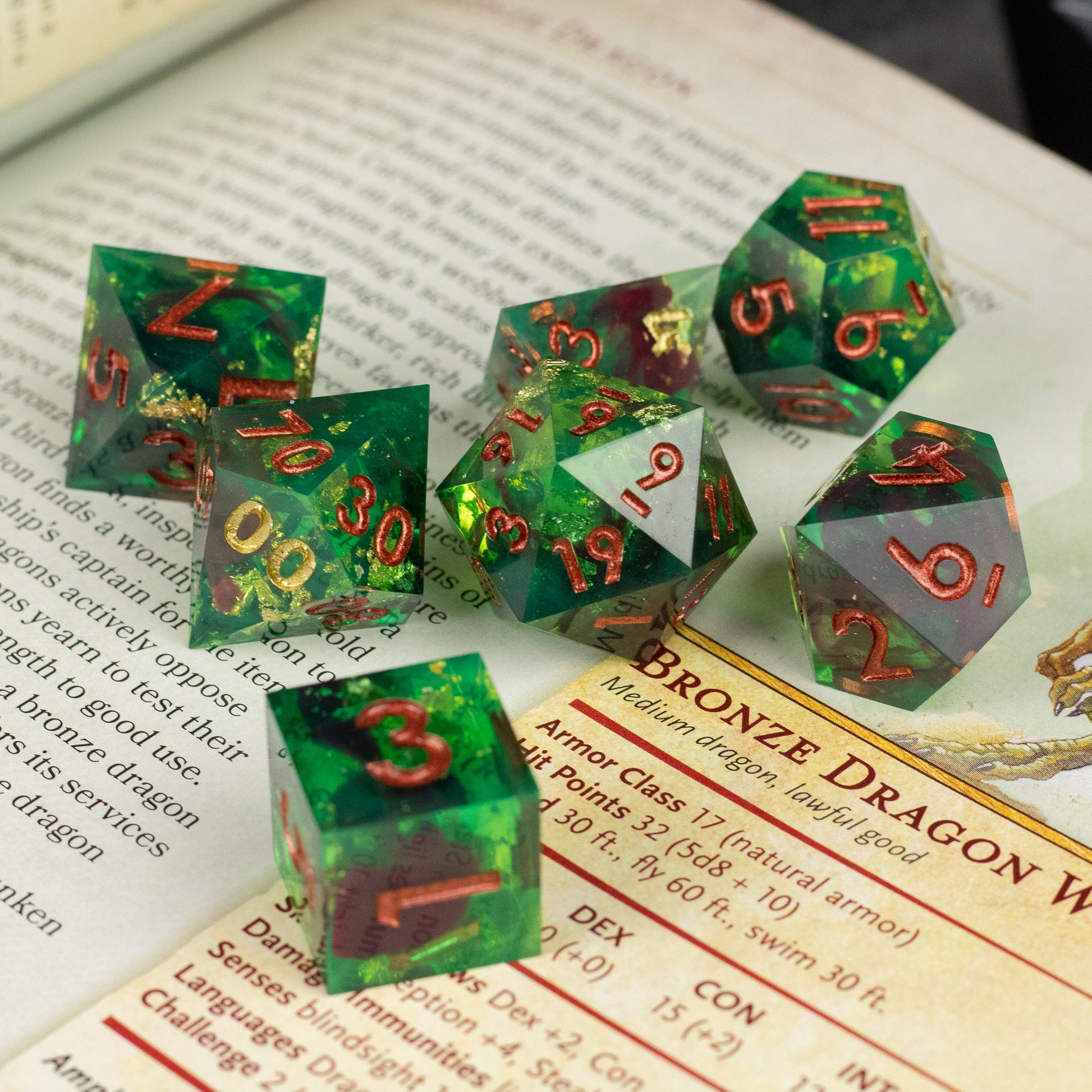 Primal Blood Dice Set - Green translucent sharp-edged dice with red numbers, featuring multiple polyhedral shapes for gaming.