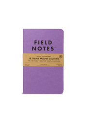 5E Game Master Journals - Purple softcover 5E Game Master Journal with black "Field Notes" text and kraft paper band wrap.