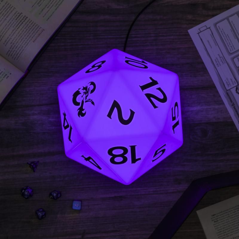 Color Changing D20 Light - Purple glowing 20-sided die lamp with black numbers on wooden surface.