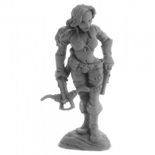 Legends: Tara the Silent - Unpainted fantasy miniature of armored female warrior with crossbow and dual pistols on rocky base.