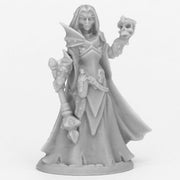 Dark Elf Priestess - Unpainted dark elf priestess miniature holding a skull and staff with flowing robes and intricate armor details.