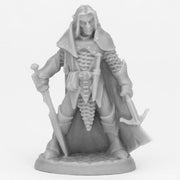 Bones Black: Drow Male Fighter - Black unpainted Drow male fighter mini with detailed armor, cloak, and two weapons.