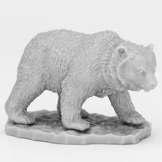 Bones Black: Cave Bear - Gray plastic miniature of a cave bear walking on textured base with detailed fur and facial features.