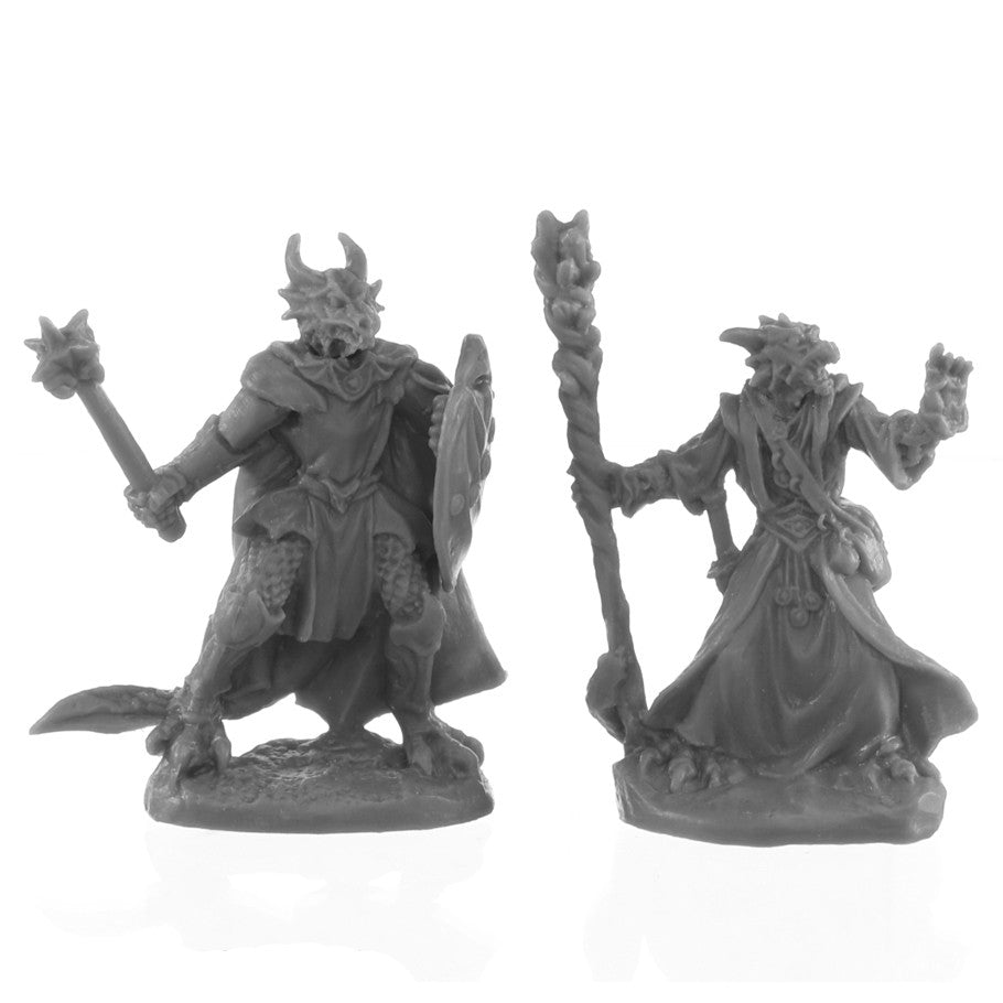 Bones Black: Dragonfolk Wizard and Cleric - Two black dragonfolk miniatures, one armored with a mace and shield, the other robed holding a staff, both with horned.