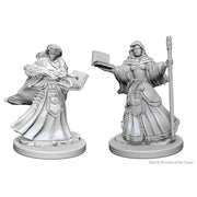 Dungeons & Dragons: Nolzur's Marvelous Minis: Human Female Wizard W1 - Unpainted miniatures of a female wizard in flowing robes, one holding a book and the other a staff with an open spellbook in .