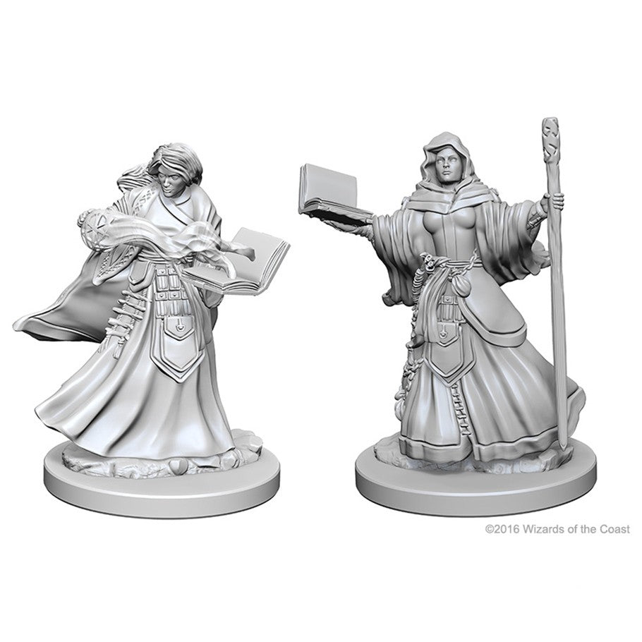 Dungeons & Dragons: Nolzur's Marvelous Minis: Human Female Wizard W1 - Unpainted miniatures of a female wizard in flowing robes, one holding a book and the other a staff with an open spellbook in .