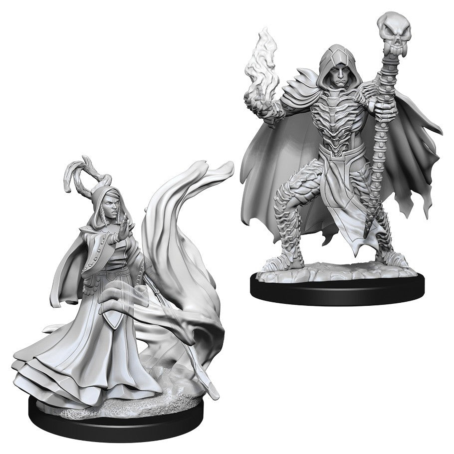 Pathfinder Battles Deep Cuts: Necromancers W10 - Two unpainted fantasy necromancer miniatures, one hooded with a staff and skull, the other casting a spell with flowing.