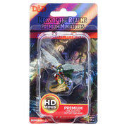 D&D: Icons of the Realms: Premium Figures: Aasimar Female Wizard - Female Aasimar wizard miniature with glowing wings and staff in colorful blister pack packaging.
